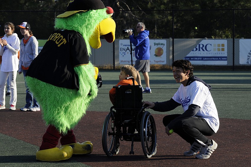 Six-year-old Chance French enjoyed spending time with the Pirates mascot and his new buddy.