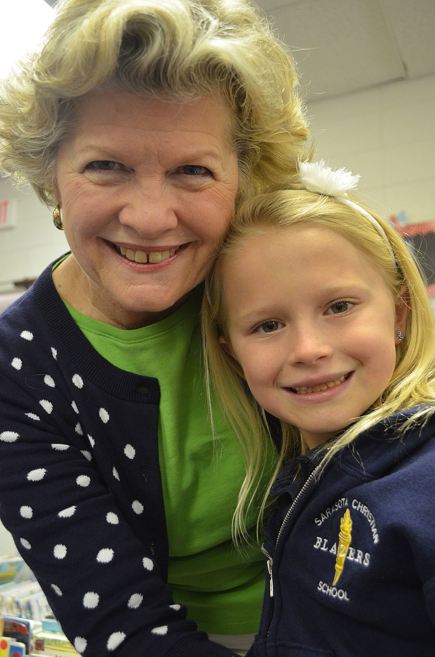 Megan Voigt shows her grandmother Deby Rutledge around her classroom.