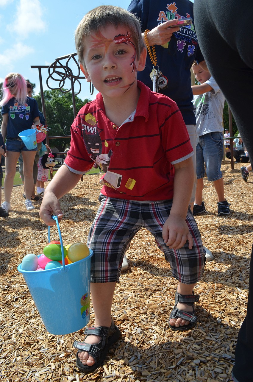 Dominic Stellwagen hunts for Easter eggs.