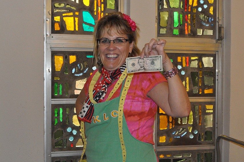 Della Goetz sells raffle tickets.