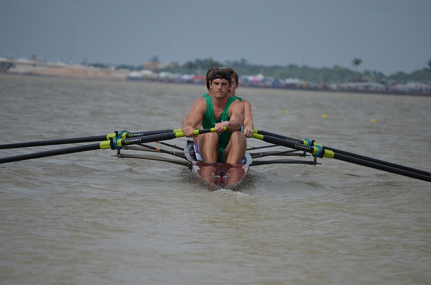 Victor Garguan rows with Sarasota Scullers teammates Sam Bretz, Tommy Scarpiato and Nathan Marshal in the Boys Varsity 4. The team came in first place in their heat.