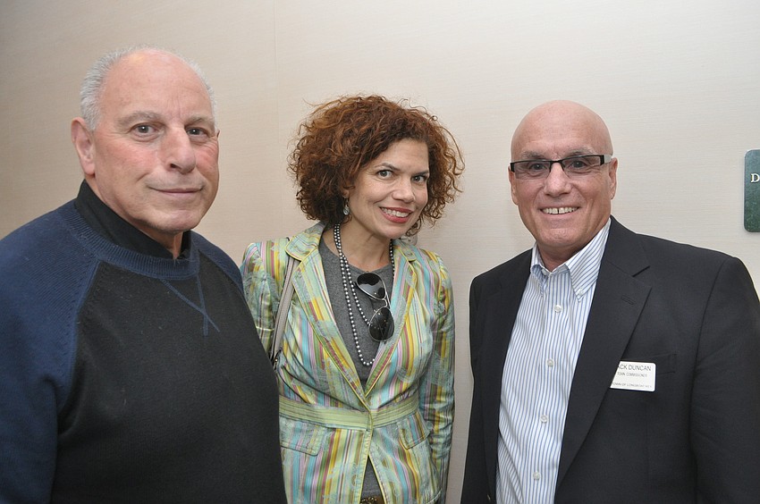 Vince LaPorta of the Longboat Key Club, Heidi Webber and Commissioner Jack Duncan