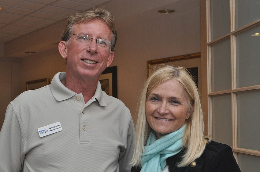 Greg Hayes of Merchant Service with Debbie Lamb of Signs Now