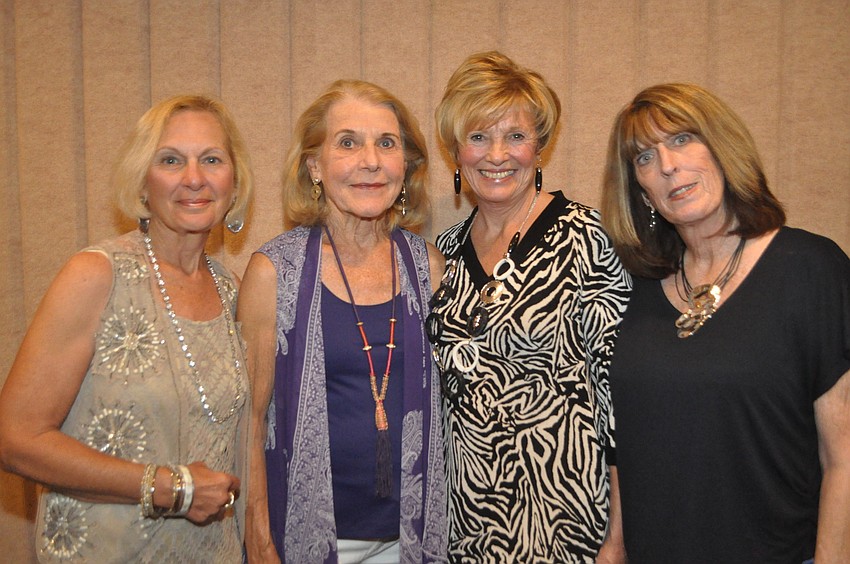 Wendy Poelke, Sally Wright, Carlene Baime and Sally Reed model Chicos fashions.