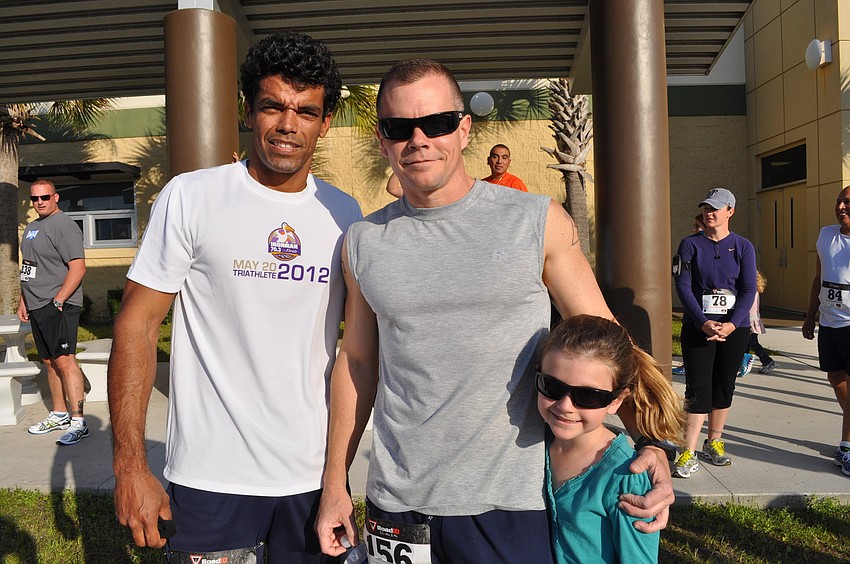 Andy Ramdath with Joe Skala and his daughter, Alivia