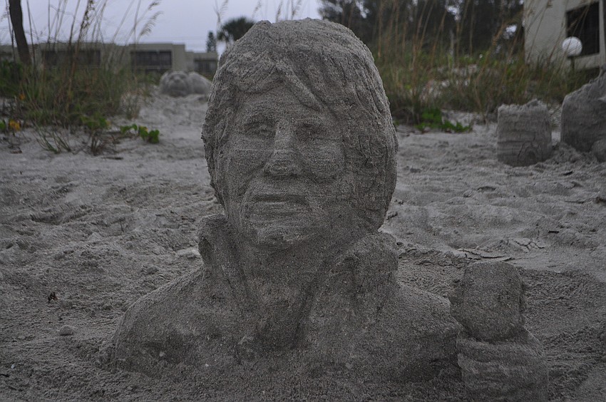 Eric Widitz sculpted a sand bust of Elvis Presley.