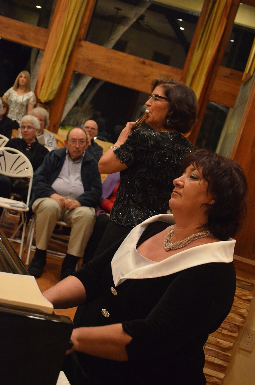 Jane Hoffman and Zara Baroyan perform for a crowd of about 90 people.