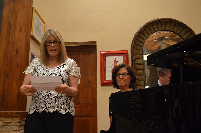 Vivian Kalvaria addresses her guests.