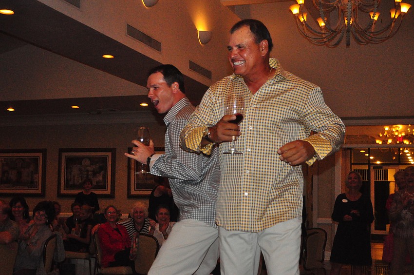 Tennis pros Claudiu Retean and Sammy Aviles have fun on the catwalk.