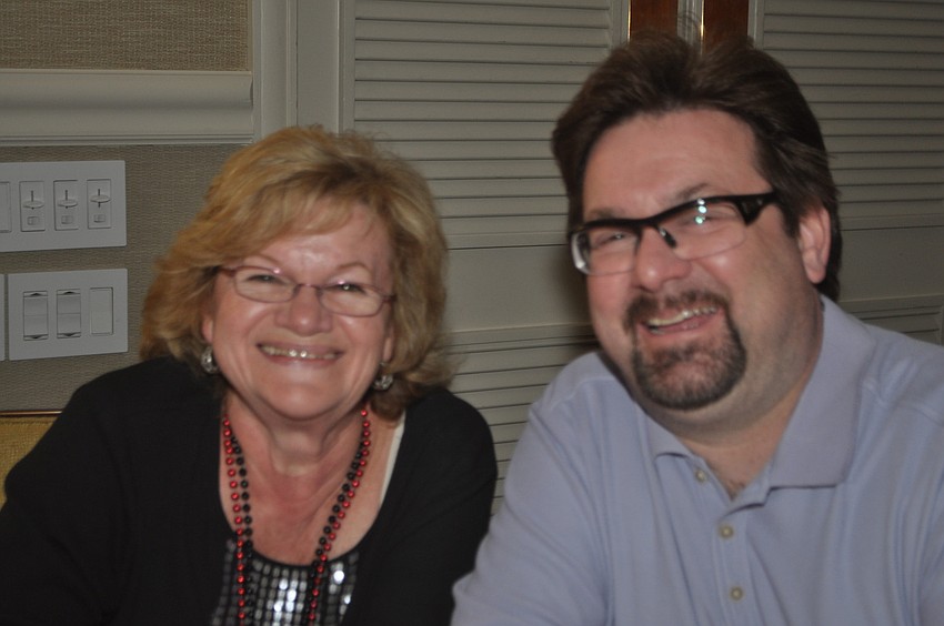 49ers fans Trudi Bartakovics and Ronald Mueller watch the game at the Longboat Key Club.