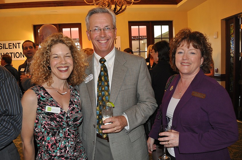 Boost Studioâ€™s Christine Koch, Michael Vejins of Raymond James and Brynne Anne Besio of South Florida Museum