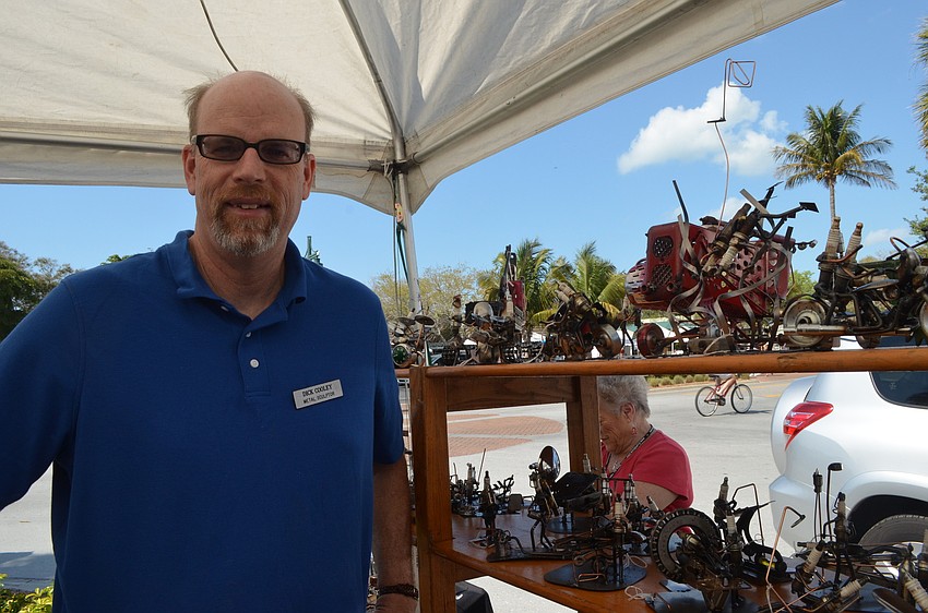 Dick Cooley uses more than 5,000 spark plugs a year for his metal scrap sculptures.