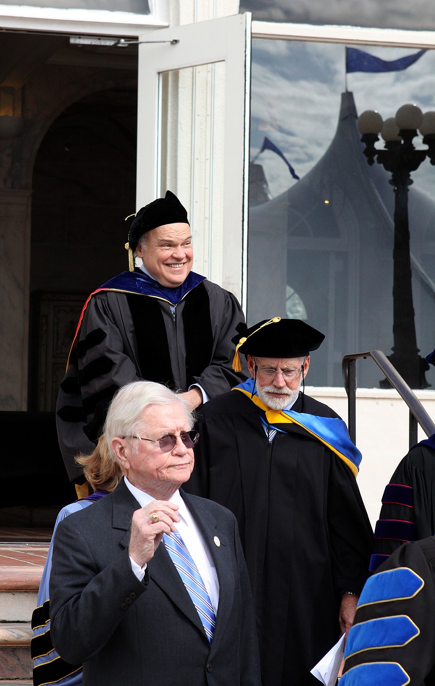 Dr. Donal Oâ€™Shea walks out of College Hall and heads towards the tent to be inaugurated as New Collegeâ€™s 5th president.