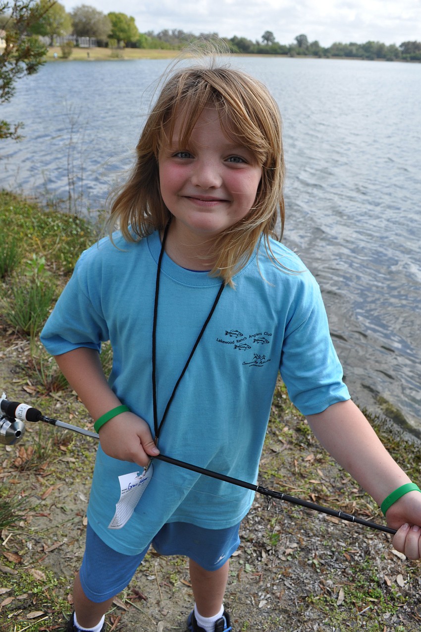 Grace Huber, 9, fished with her sisters, Carlie and Hailey, not pictured.