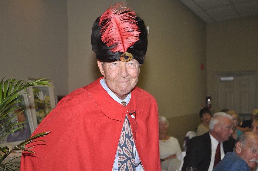 Tom Sabow dressed as Carnac for a fun skit that incorporated trivia about members.