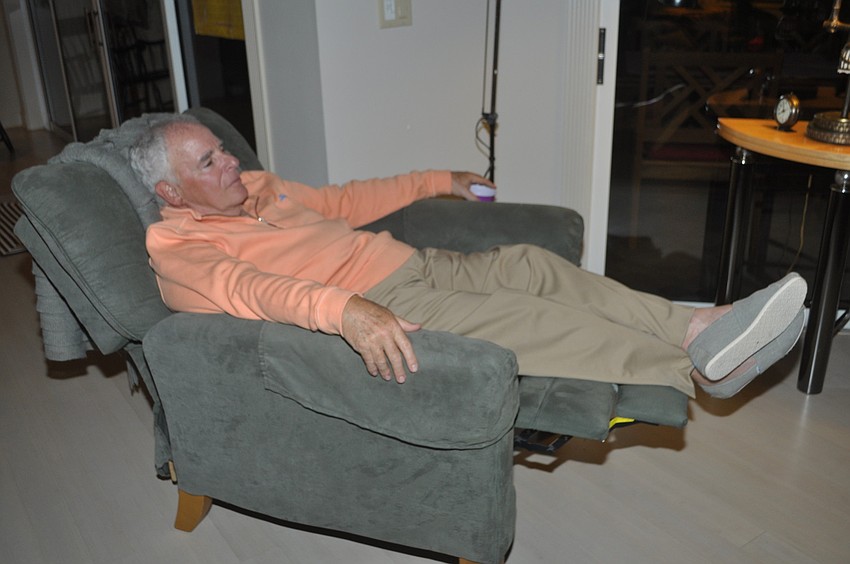 Marvin Hamburg watched the covered from a recliner.