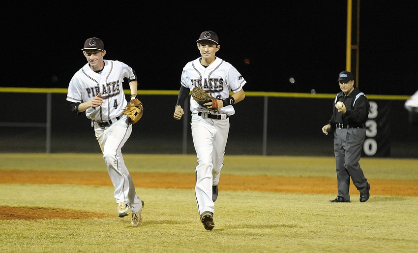 Braden Riverâ€™s Ryan Dyson and Tyler Dyson congratulate one another following the final out of the fourth inning.