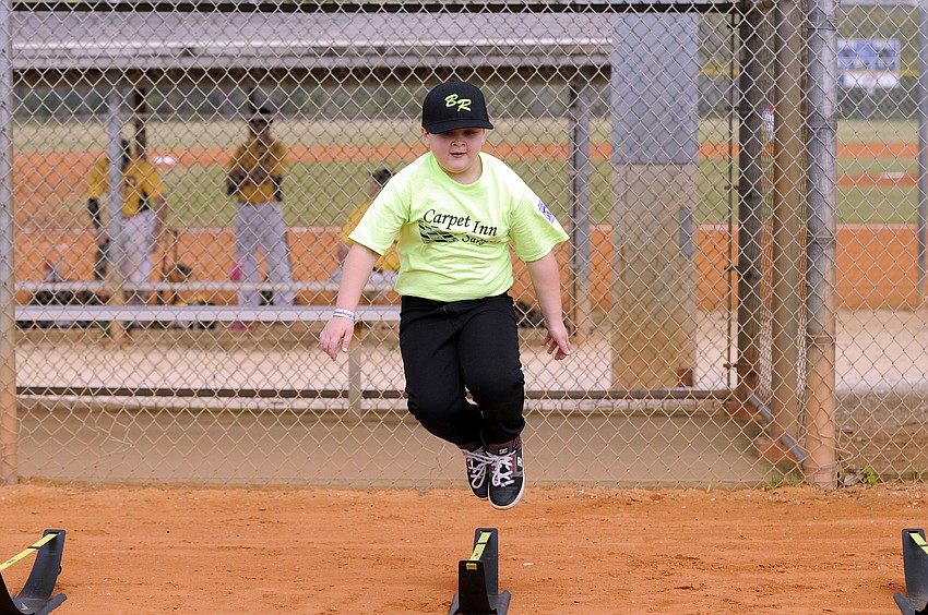 Seven-year-old Bobby Pike tests his agility.
