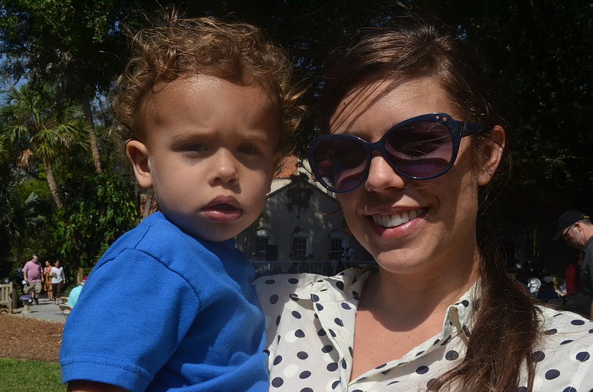 Sixteen-month-old Bryson Hand with his aunt Erika