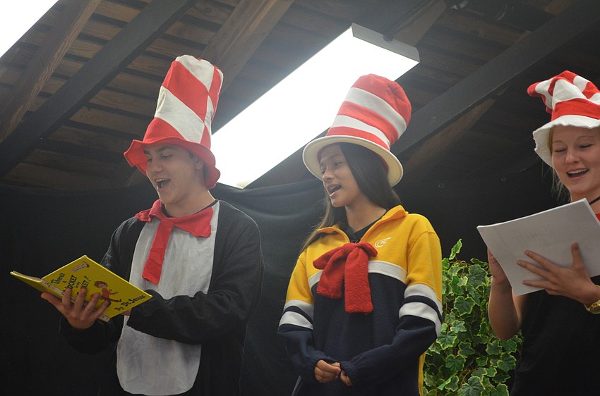 Seniors Kevin Moody, Cheyene Kerekes and Brenna Ramsey read Thereâ€™s a Wocket in my Pocket.