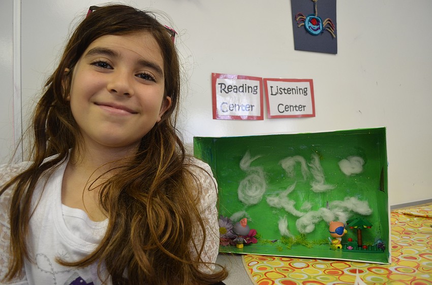 Antonia Forlenza shows off her project.