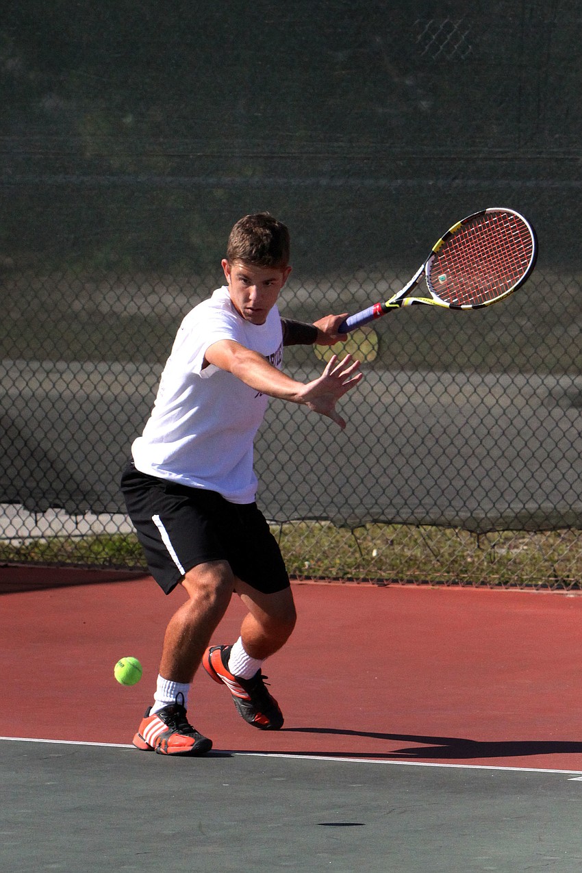 Riverviewâ€™s Austin Cruz prepares to hit the ball during his match.