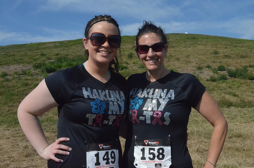 Lynnsie Pentecost and Kelley Burch wear the same t-shirts at different 5Kâ€™s that they run.