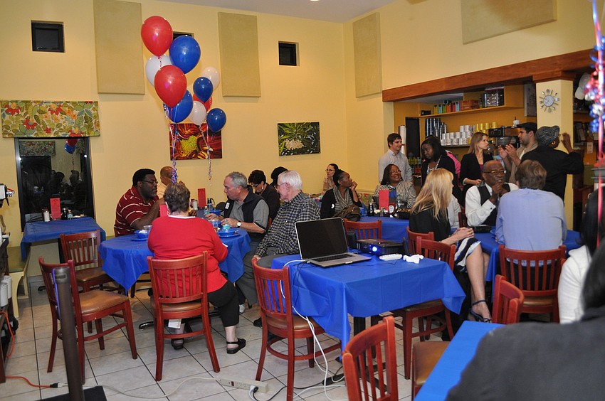 Supporters of Kelvin Lumpkin show mixed emotions at the Toasted Mango Cafe, after unofficial results show the Sarasota City Commission candidate did not make the run-off election.
