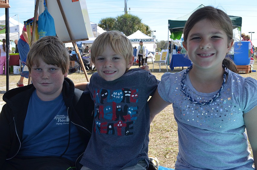 Connor Keane with twins Jaime and Jason Dela