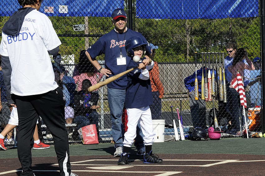 Payton Aaron makes contact in his first at bat with the Braves.