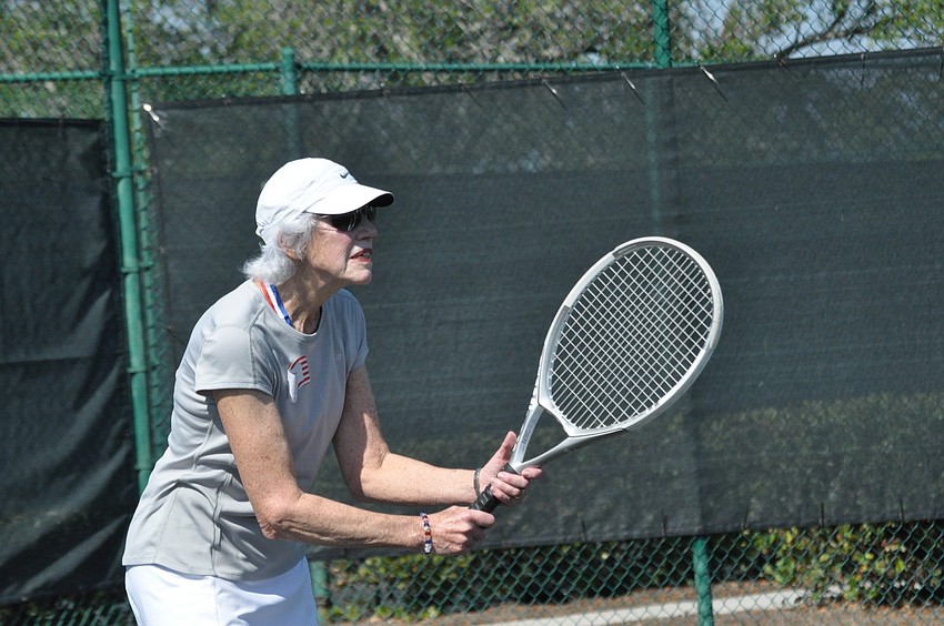 Myrna Blume prepares to return a serve.