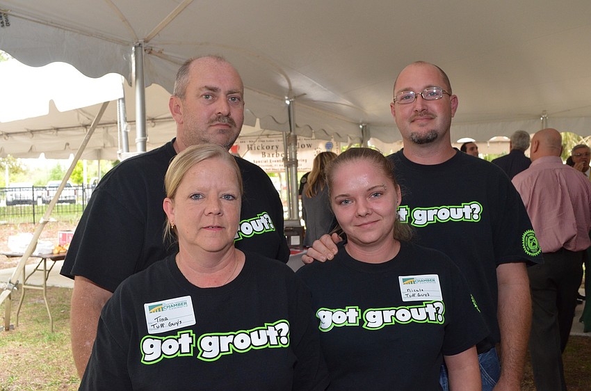 Scott and Tina Griffith with Nicole White and Tom Lakey specialize in tile and grout work.