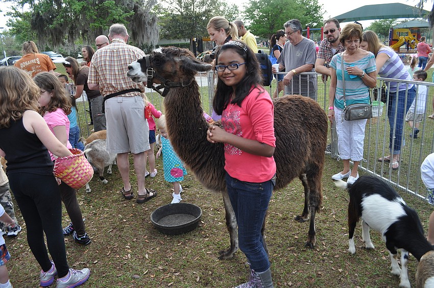 Raiesha Alam got over her fear of llamas to pose for a photo.