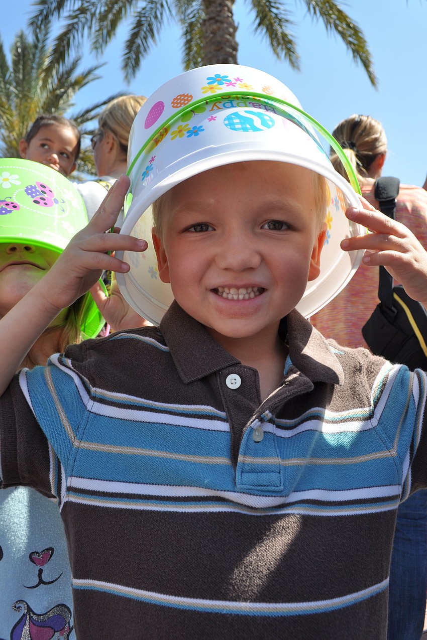 Christopher Snipes, 5, found a creative use for his basket before the hunt started.