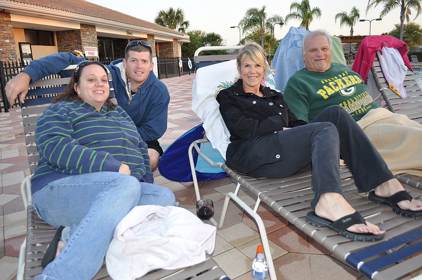 Jennifer and Joe Dyer with Lisa Badolato and George Vokey enjoyed a night out, even if it meant catering to their children.