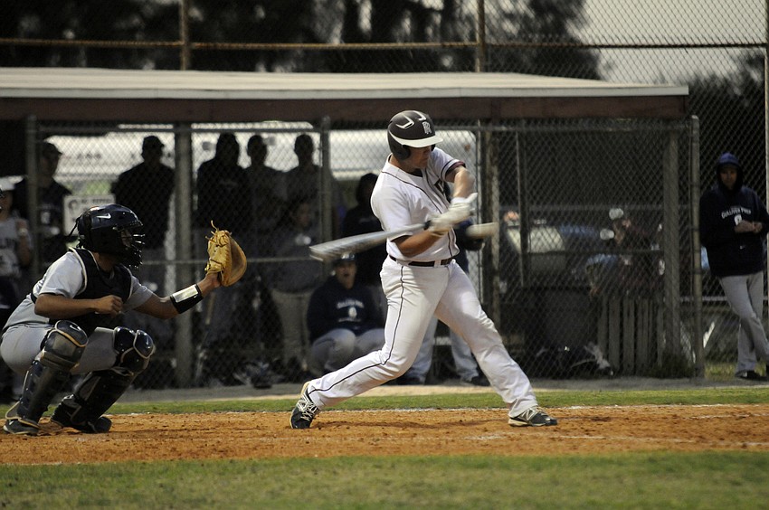 Riverview junior Sam Dannheisser looks to make contact midway through the Rams 5-1 victory over Gulliver Prep March 25.