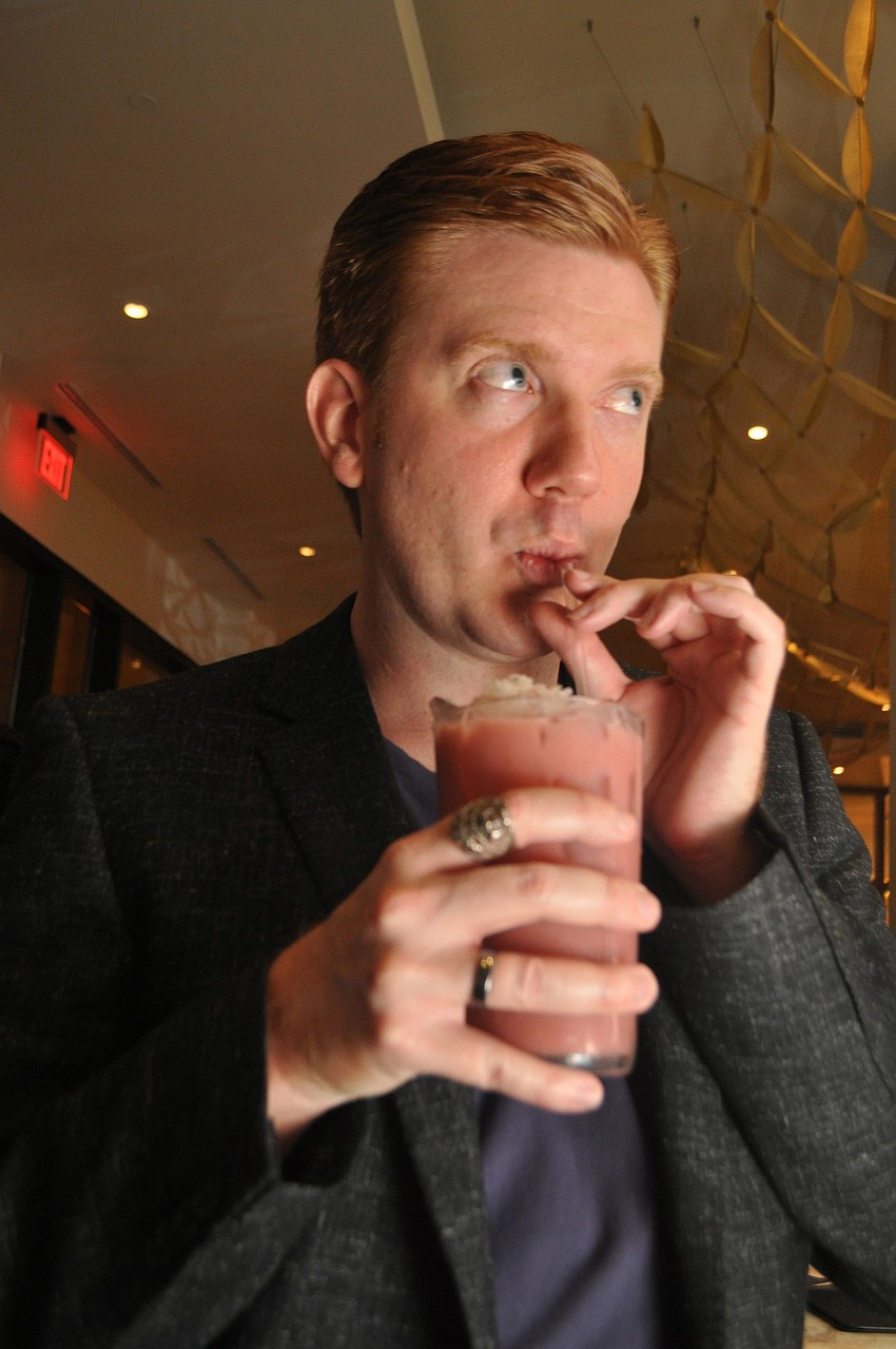 Matthew McLendon sips a Purserâ€™s Bane with passion fruit