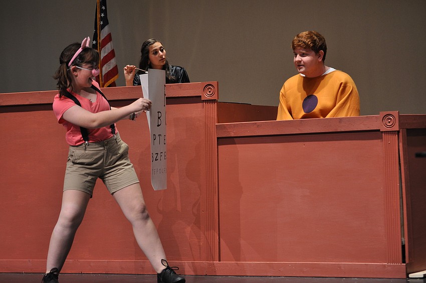 Emily Gartenberg made sure Joe Spivey, the Gingerbread Man, could see straight.