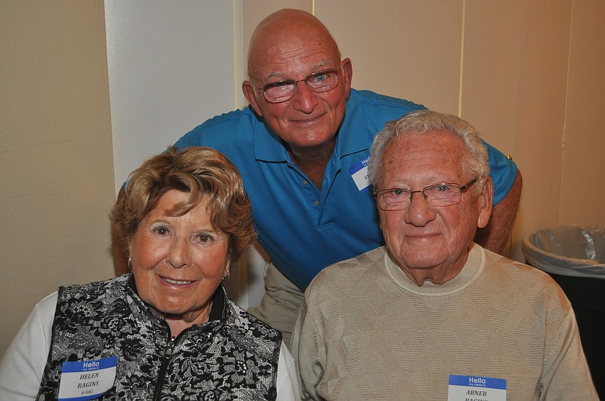 Helen and Abner Ragins with Ron Stephani at the Beachplace Super Bowl party