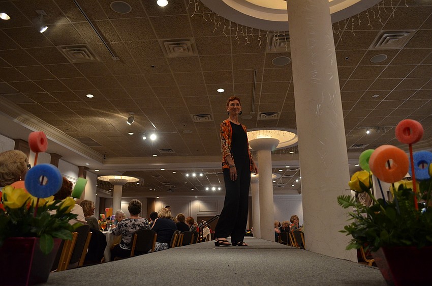 Jean Hanson walks down the catwalk.