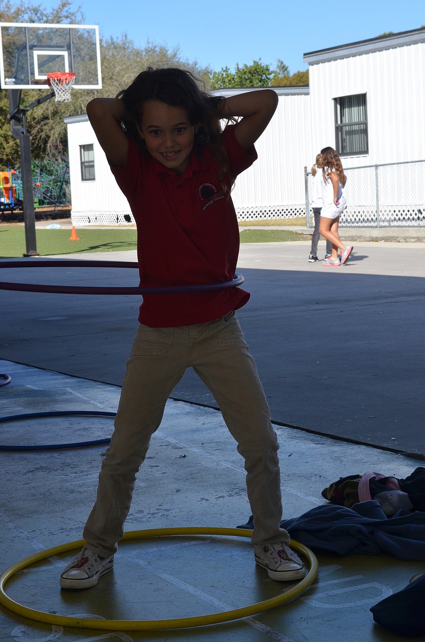 Kathryn Gardner hula-hoops to raise money for the American Heart Association. Heart disease is the number one killer in the United States.