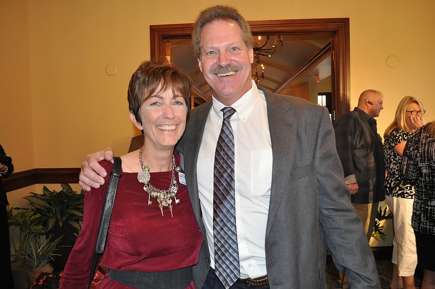 Johnette Isham with Tom Seguin, chairman of the Manatee Chamber of Commerce