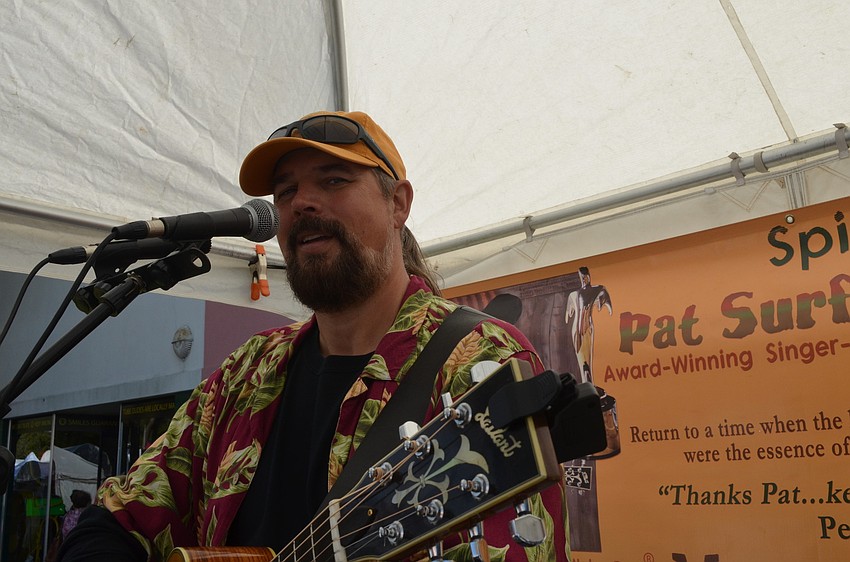 Pat Surface is a singer and songwriter who sang American folk music at the festival.