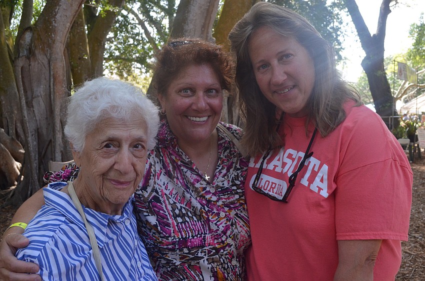 Marie Fumando with her daughter Charlene and friend Judith Sasnauskas