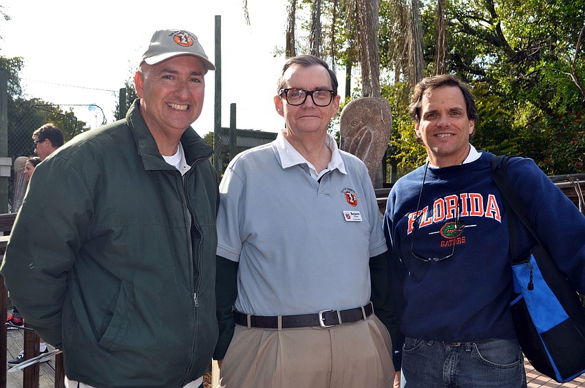 Robert Gaglio and Benjamin Moore of Save Our Seabirds with Rick Hughes of the Sarasota Rotary Club