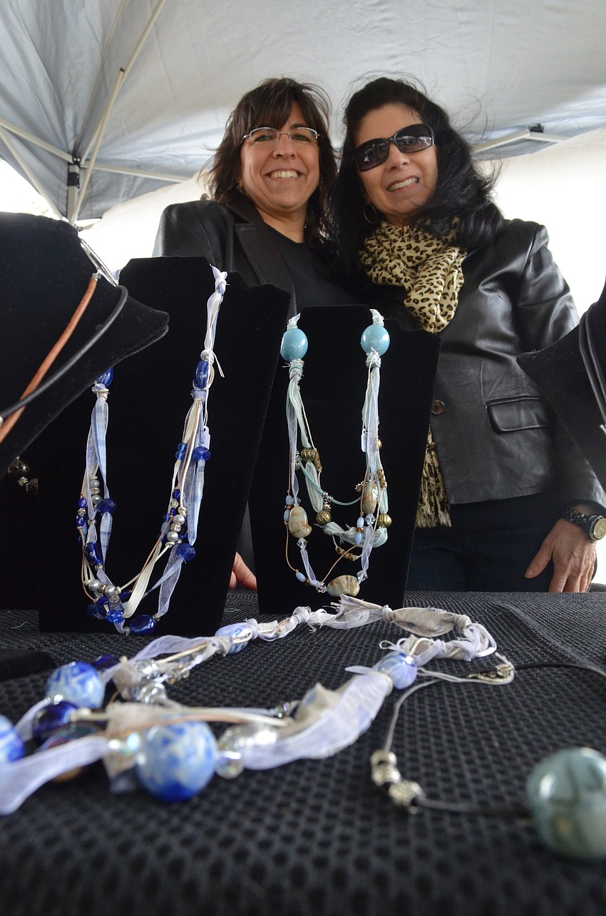Sisters Tracy Emos and Dianne Underwood make necklaces as part of their ktd Designs business.