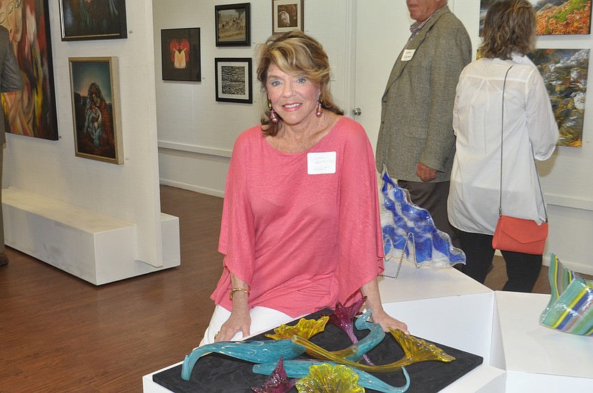 Joan Partridge with her sculpted glass flowers