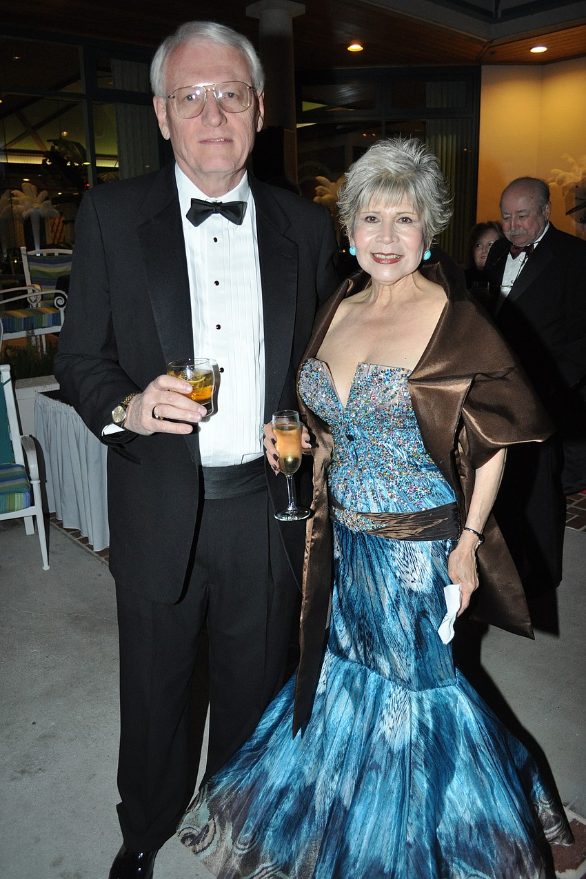 John and Teresa Phillips. Teresa bought her Italian-made dress in Europe.