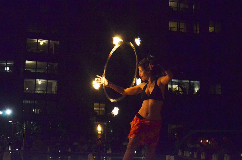 Hula dancer Bonnie Brown dazzled the crowd with her movements.