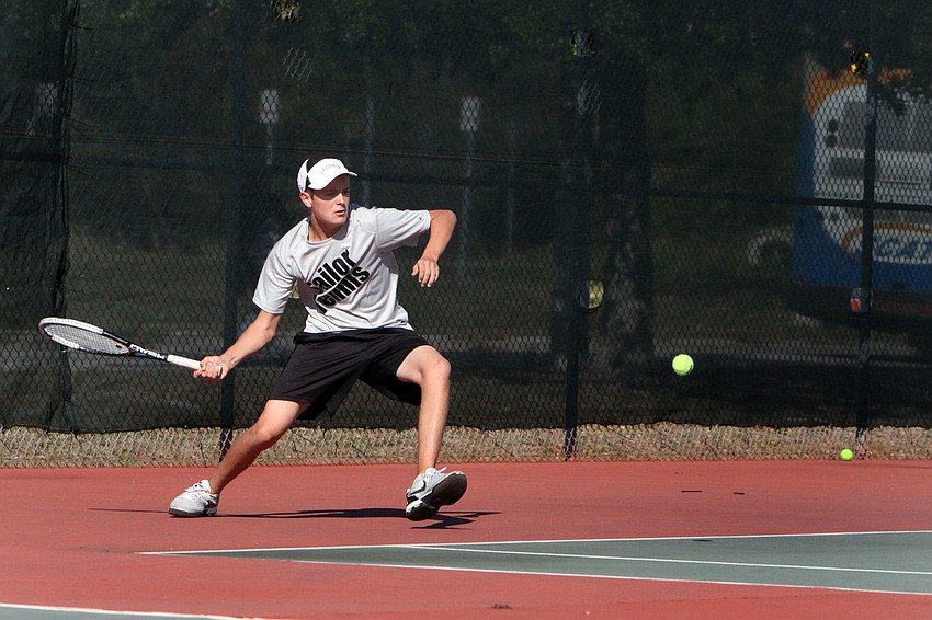 Sarasotaâ€™s Connor Hester gets low to hit the ball.
